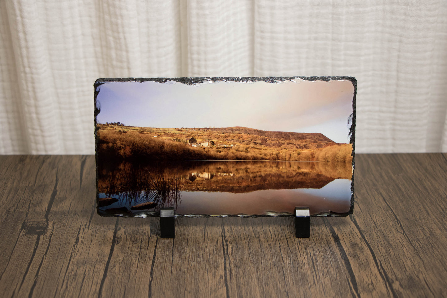 Rectangular slate with a scenic reflection of Talysarn village in the lake.