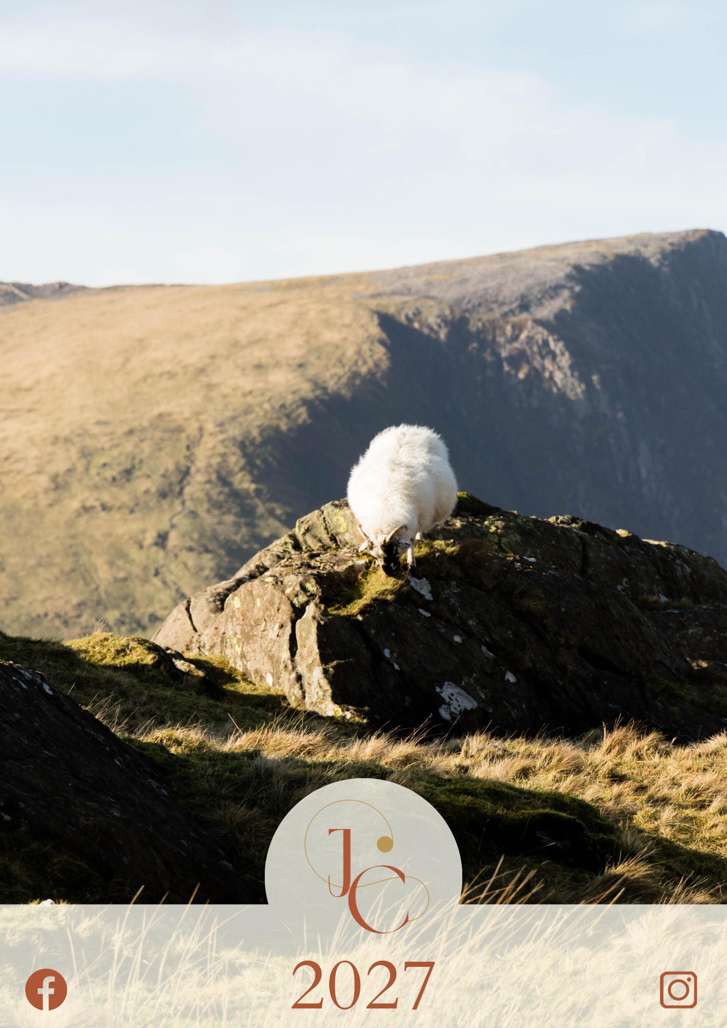 Sheep on a rocky outcrop with a scenic background, featuring the brand 'JC' and the year 2027.