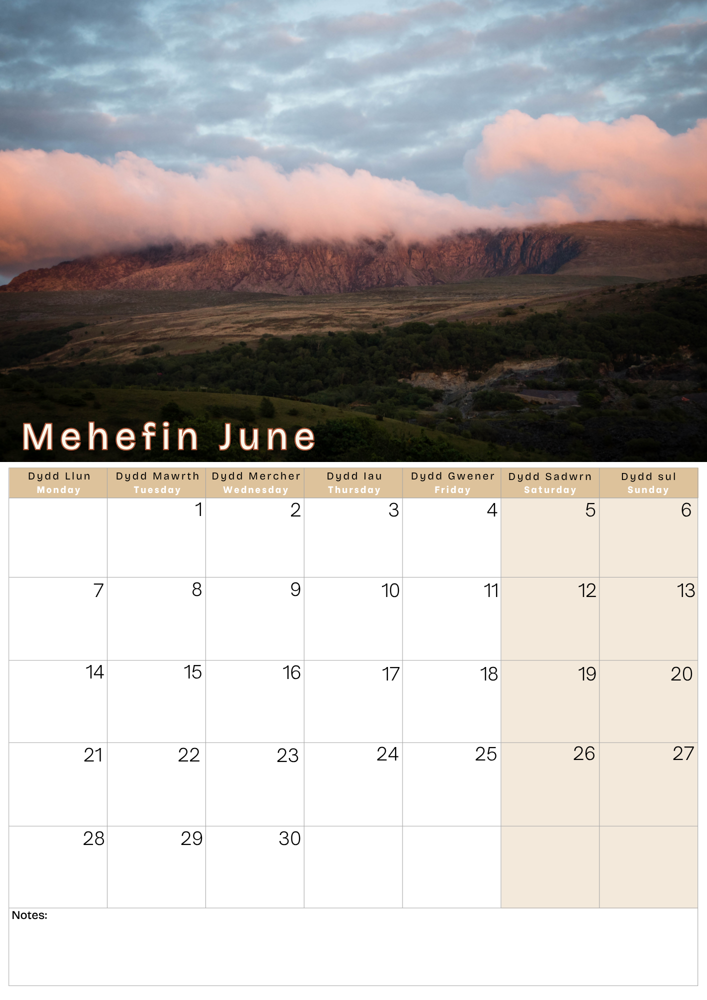 Calendar for June with a scenic mountain sunset landscape 