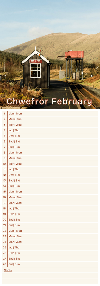 Calendar for February with a scenic railway background