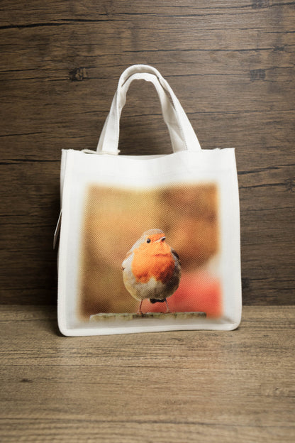 White tote bag with a robin photograph design 