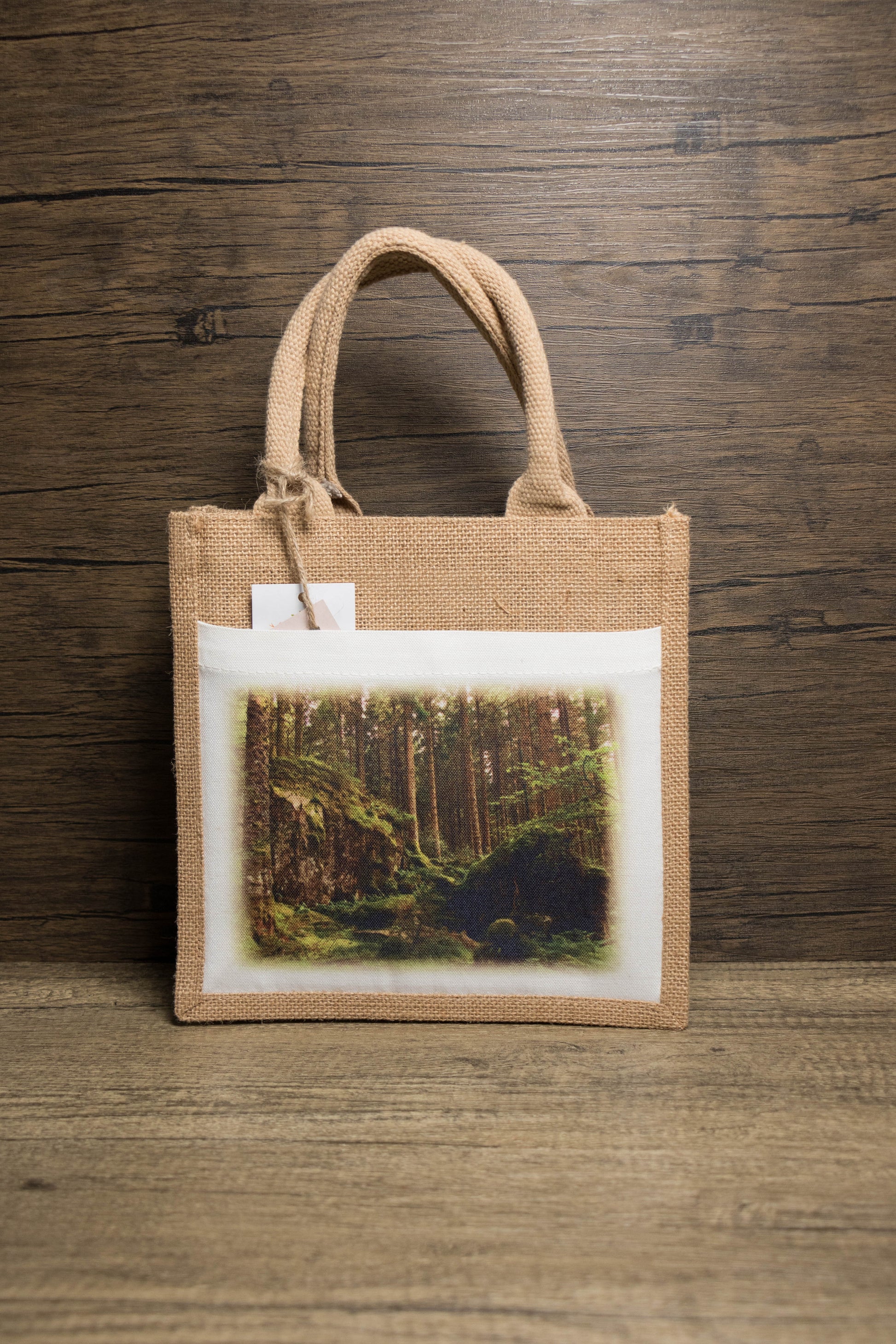 Jute bag with a forest scene print 