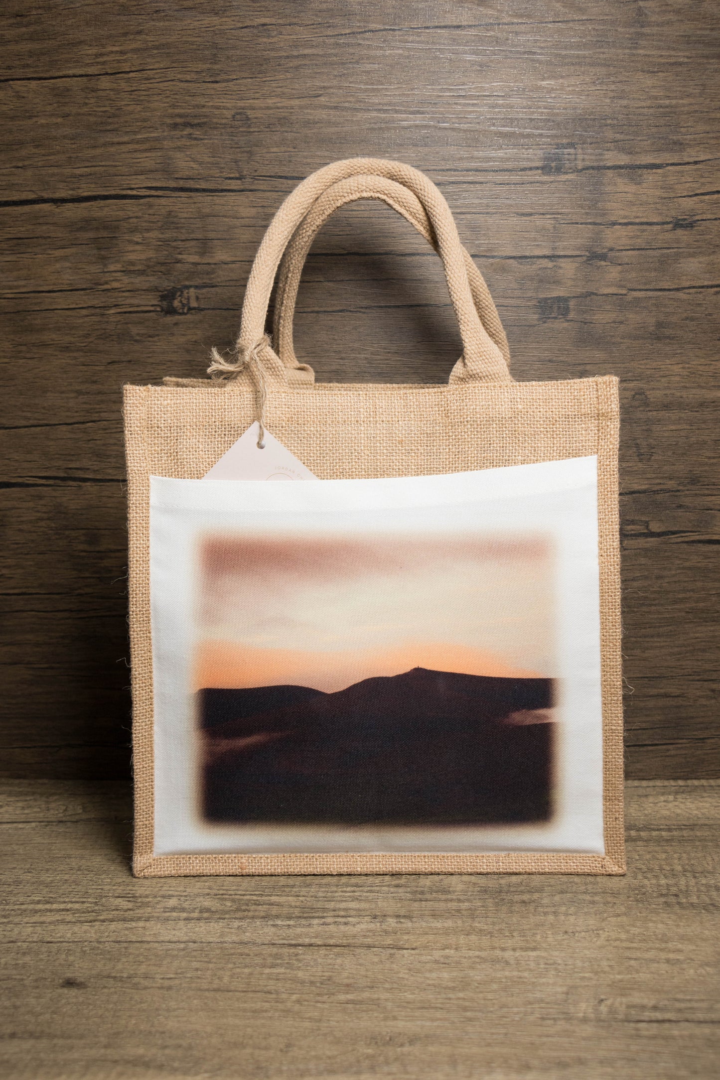 Jute bag with a sunset mountain landscape