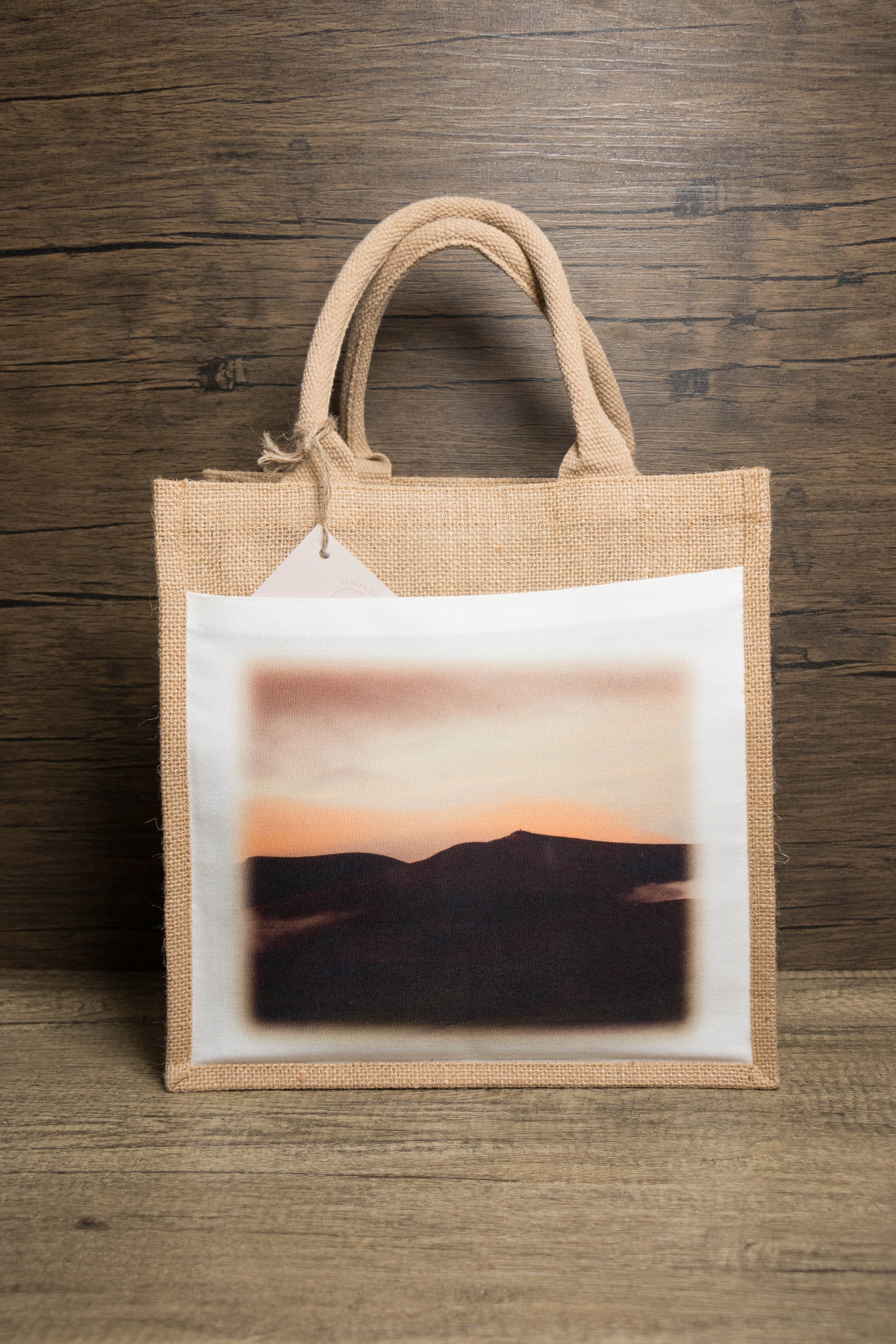Jute bag with a sunset mountain landscape